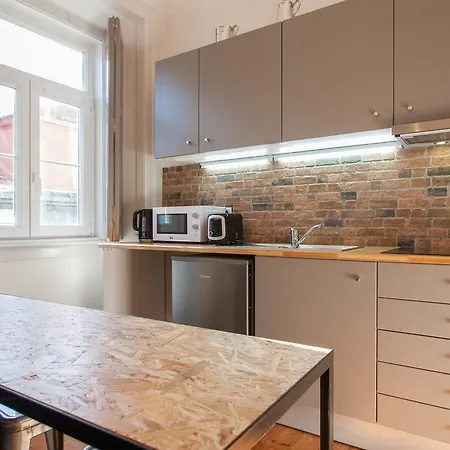 Апартаменты Cozzy Homes At Bairro Alto *